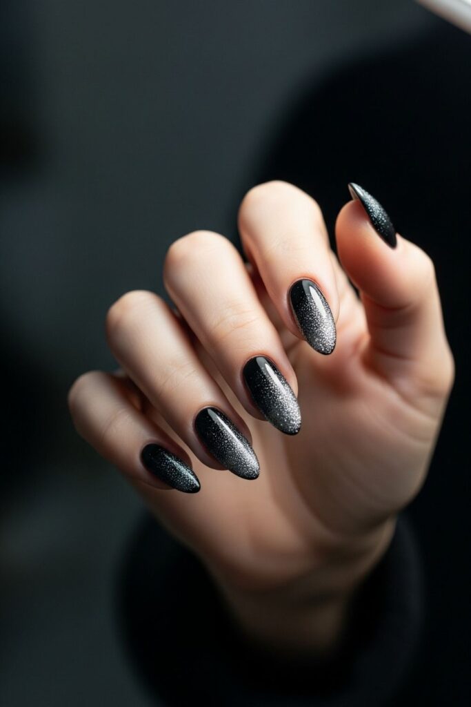 Glittery Midnight Almond Nails
