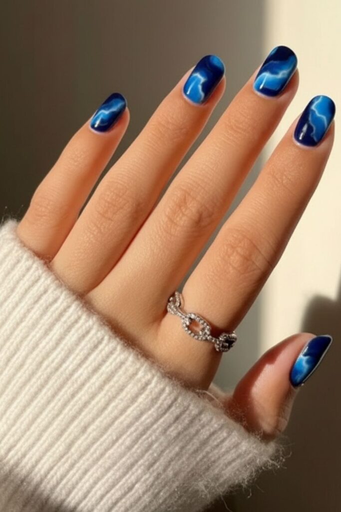 Haunting Blue Marble Nails