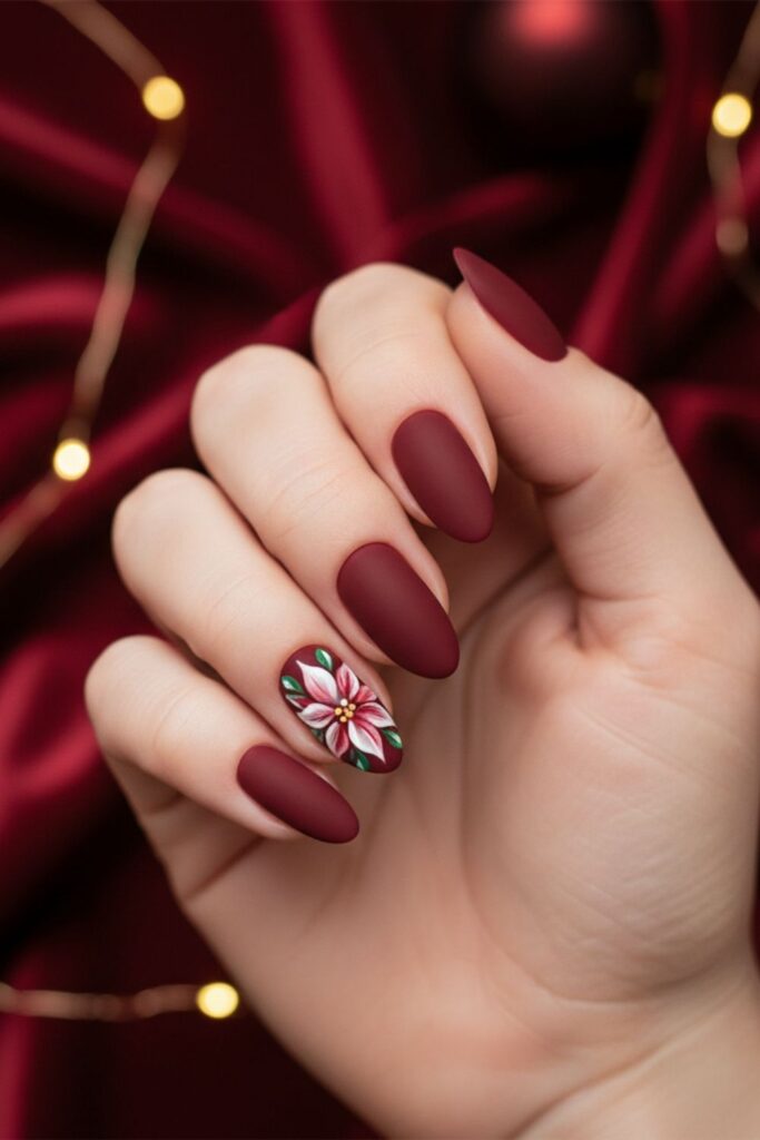 Poinsettia Accent on Deep Burgundy Nails
