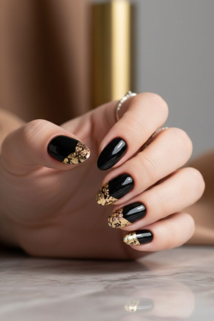Glossy Black Almond with Gold Tips Nails