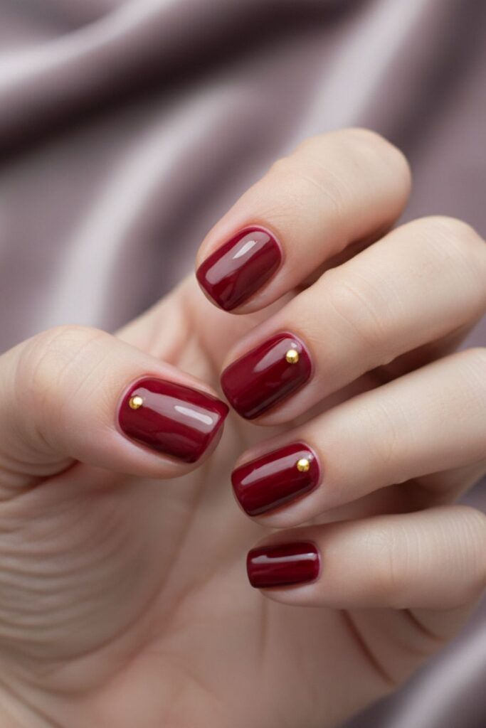 Deep Berry & Gold Dots Nails